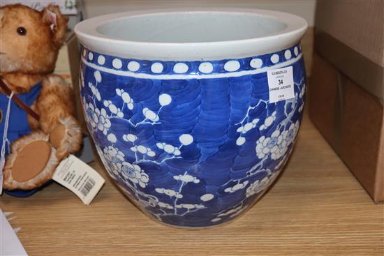 A 19th century Chinese blue and white jardiniere height 23cm